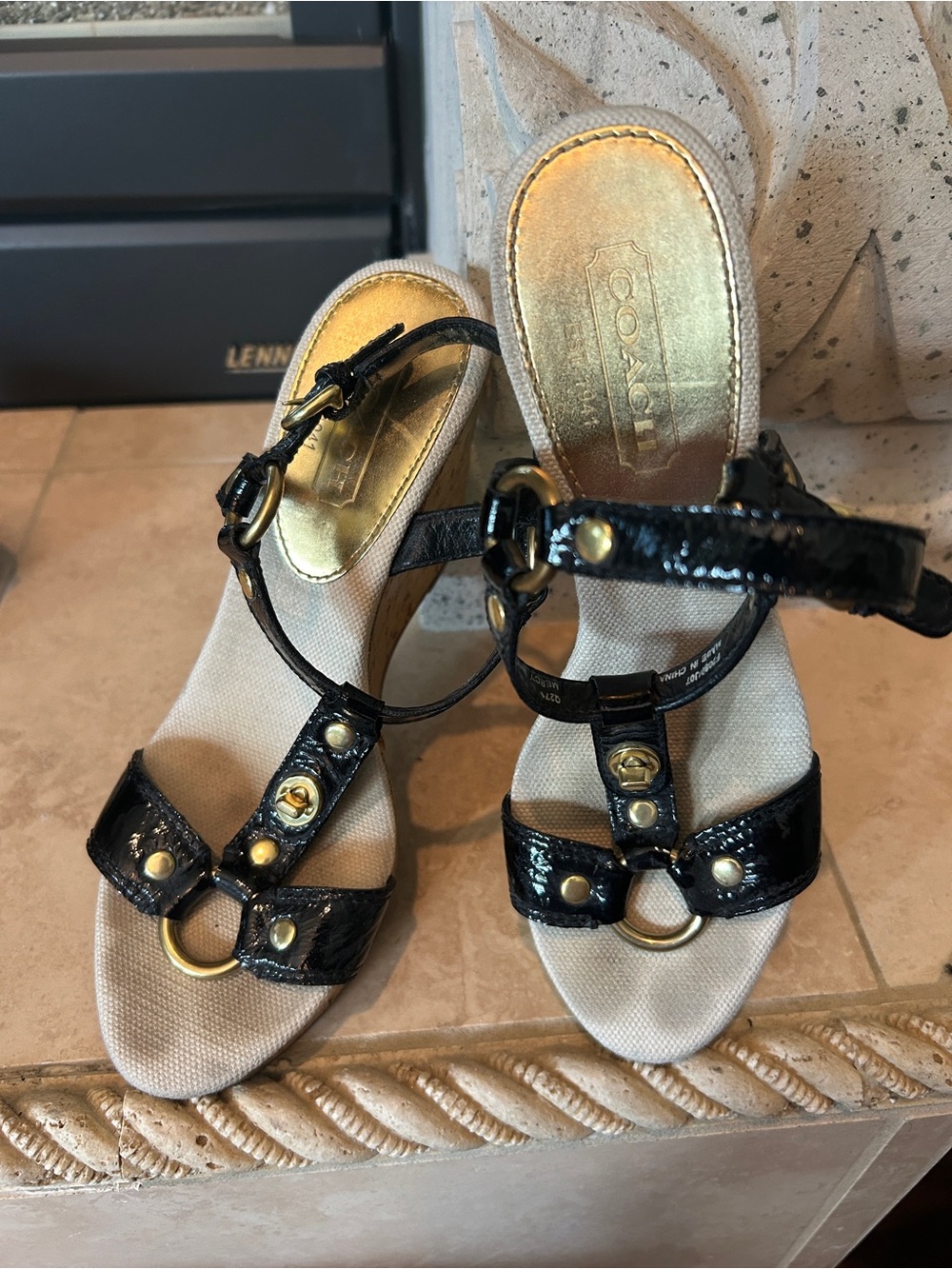 Coach Black Patent Leather T-Strap Wedge Sandals with Gold Finish Accents